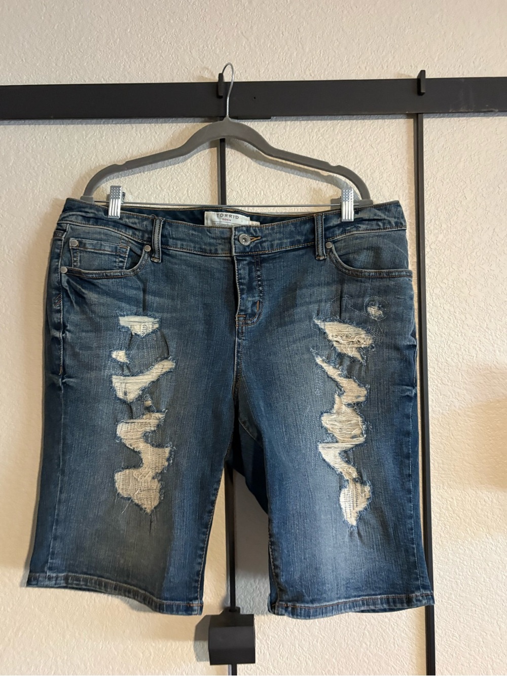 torrid distressed dark blue boyfriend Bermuda jeans
